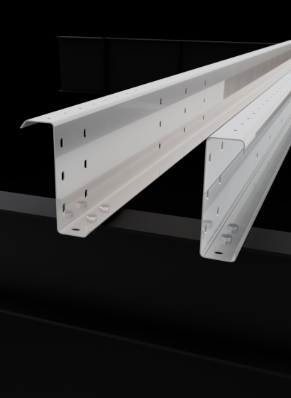Butler roof purlins shown as precision-formed steel members with pre-punched connections, engineered to support roof loads, ensure alignment, and integrate seamlessly within a coordinated building system for efficient installation and long-term performance.