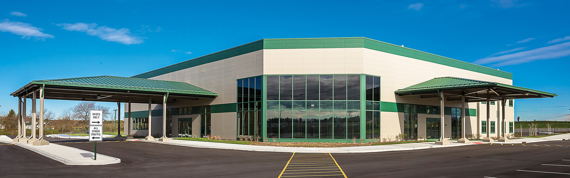 Hampton Jitney modern commercial building with covered entry canopies