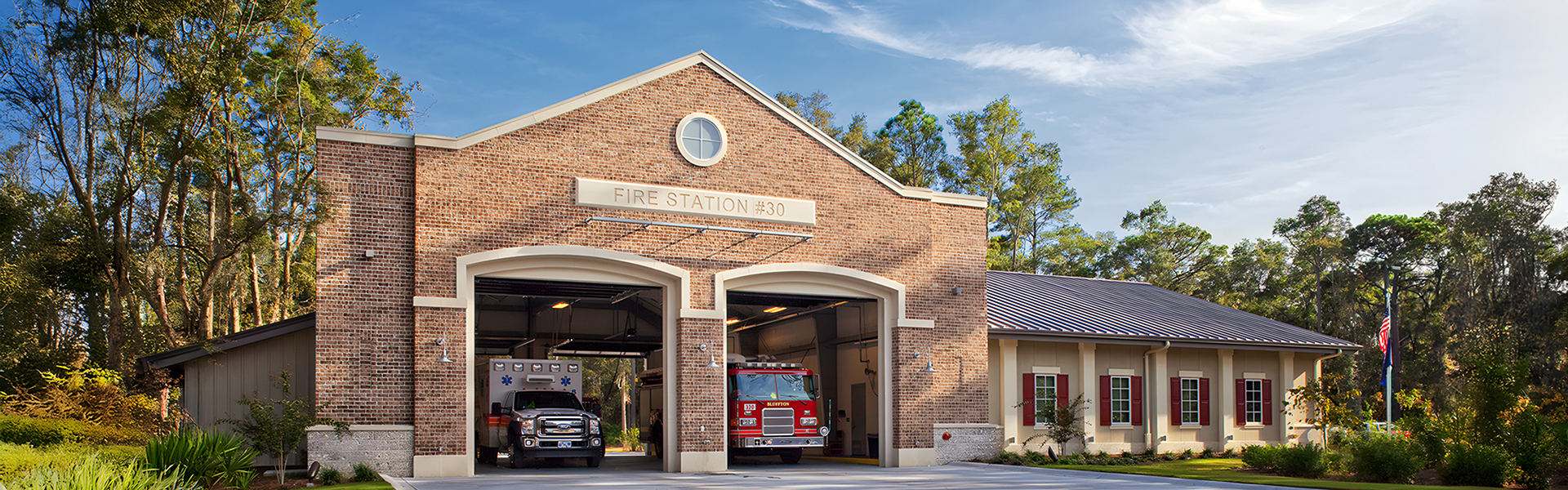 Bluffton Township Fire Station exterior brick facade and open apparatus bays