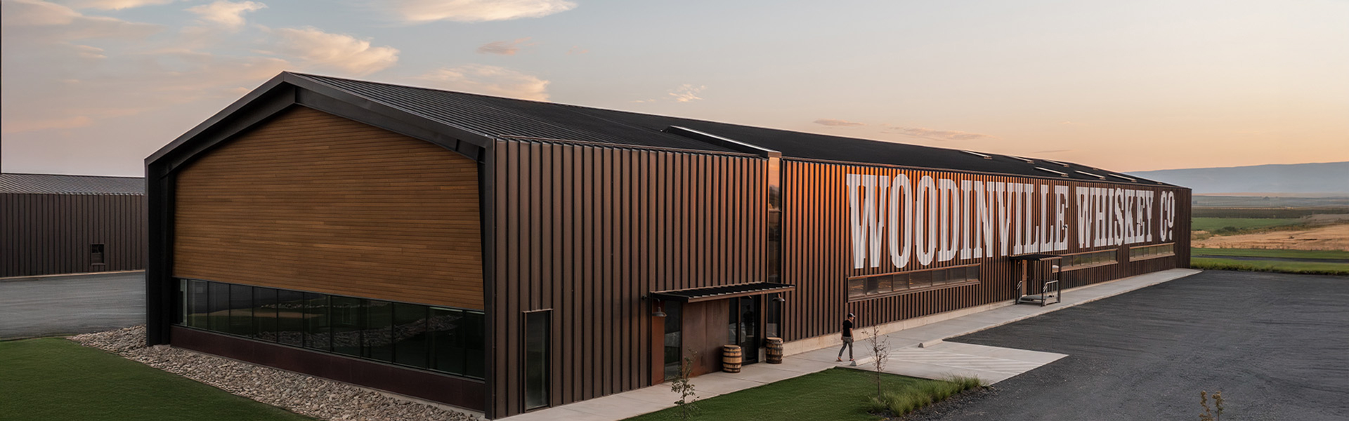 Woodinville Whiskey metal building exterior with wood accent panels