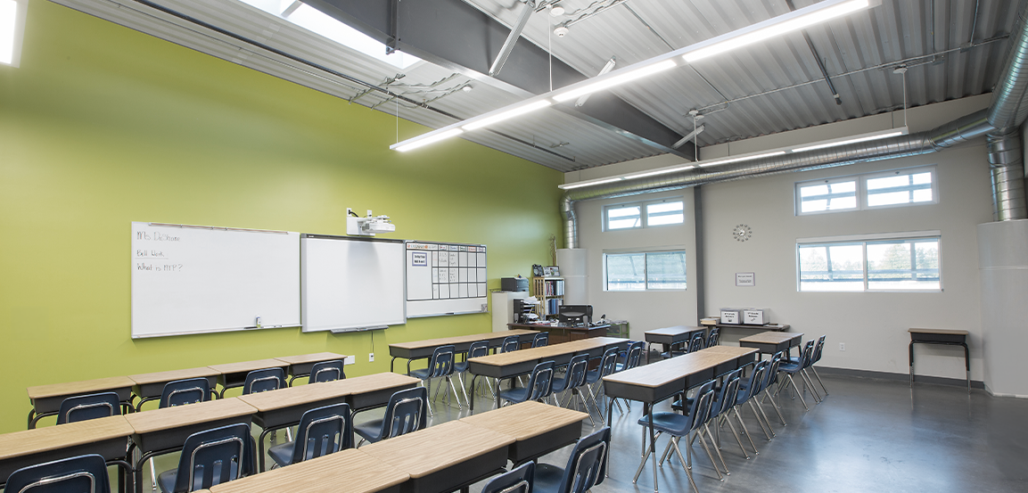 Image of classroom in Butler Building with green wall, bright lighting