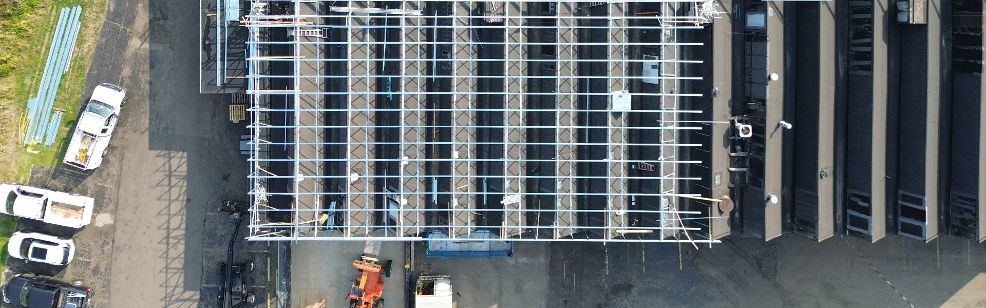 The view of a new roof on the Phoenix Metal Fabricating building.