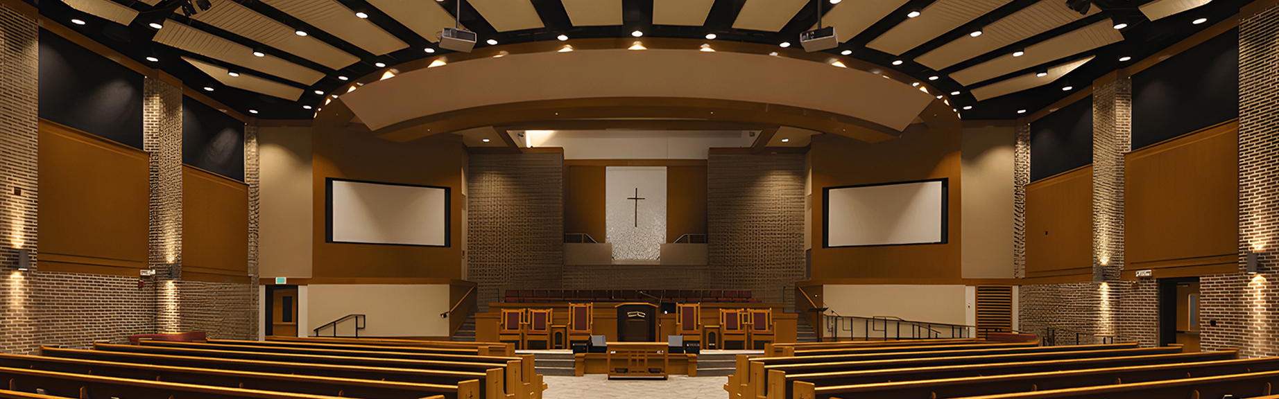 Mount Calvary Baptist Church Church interior with exposed ceiling beams with recessed lighting