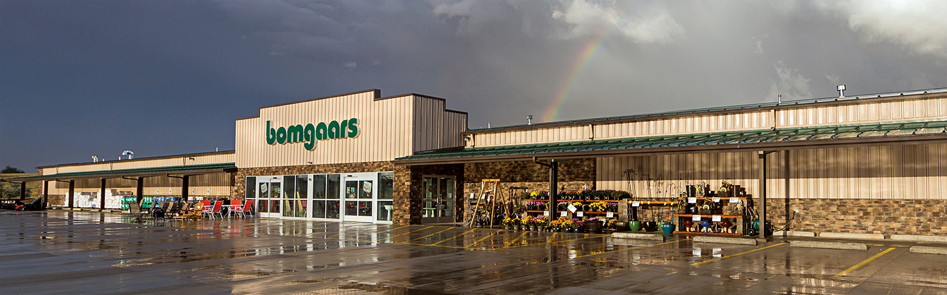 Bomgaars' store exterior with metal panel facade and covered entry