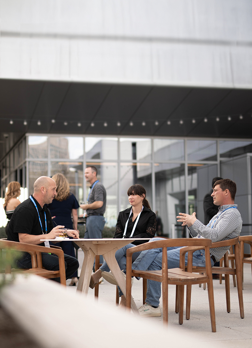 Builder and client meeting outside of a Pre-Engineered Metal Building 