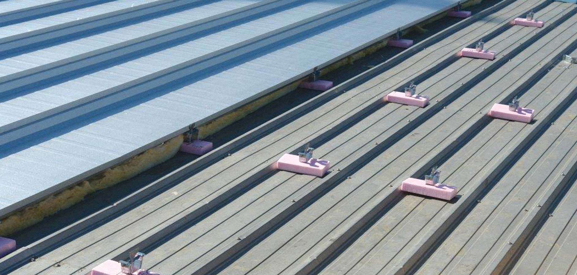 Low-Profile Metal-Over-Metal ribbed standing seam roof