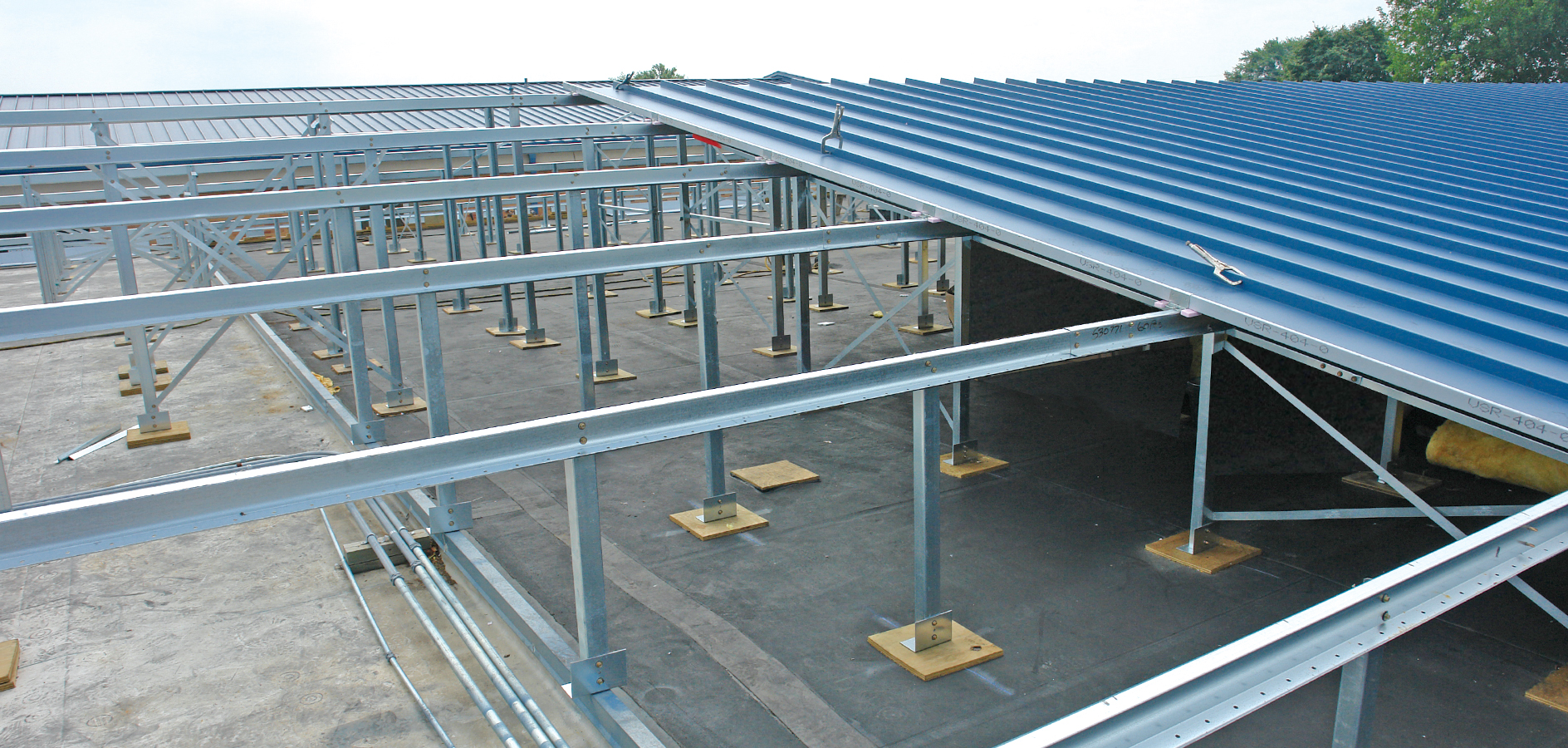 Slope Build-Up Reroof Framing System